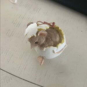 Silversti tails mouse in an egg figure. Designed by Dean Griff